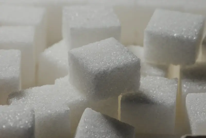 A stack of white sugar cubes